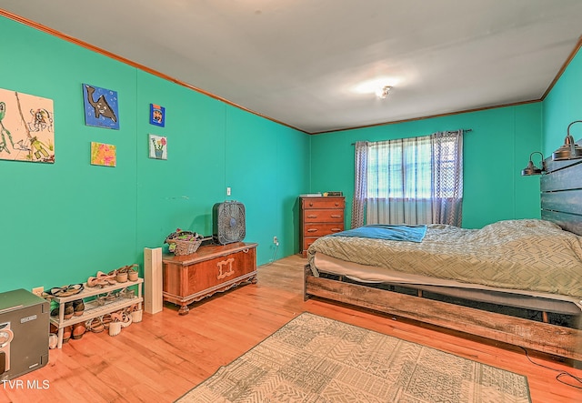 509 9th St, Erwin, TN 37650 - bedroom with ornamental molding and wood finished floors