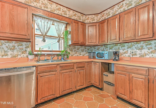 509 9th St, Erwin, TN 37650 - kitchen featuring dishwasher, wallpapered walls, a sink, light countertops, and brown cabinetry