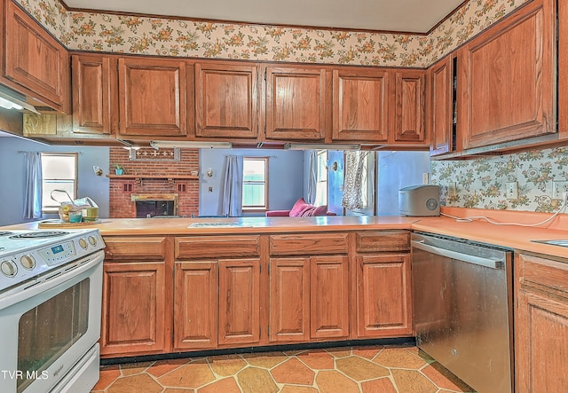 509 9th St, Erwin, TN 37650 - kitchen with dishwasher, white range with electric cooktop, brown cabinetry, wallpapered walls, and light countertops