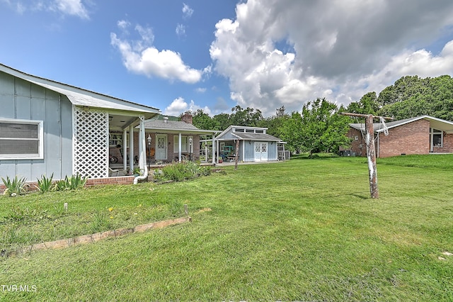 509 9th St, Erwin, TN 37650 - view of grassy yard with an outdoor structure