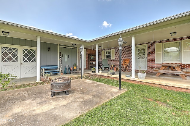 509 9th St, Erwin, TN 37650 - view of patio / terrace with a fire pit