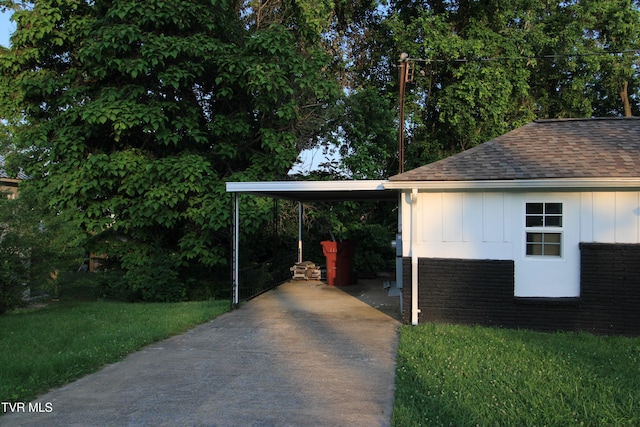 321 W Chilhowie Ave, Johnson City, TN 37604 - view of parking / parking lot featuring concrete driveway and a carport
