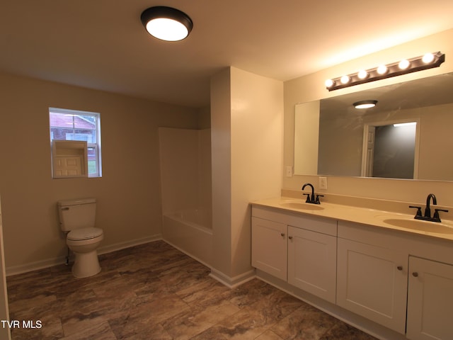321 W Chilhowie Ave, Johnson City, TN 37604 - full bath with double vanity, toilet, and baseboards