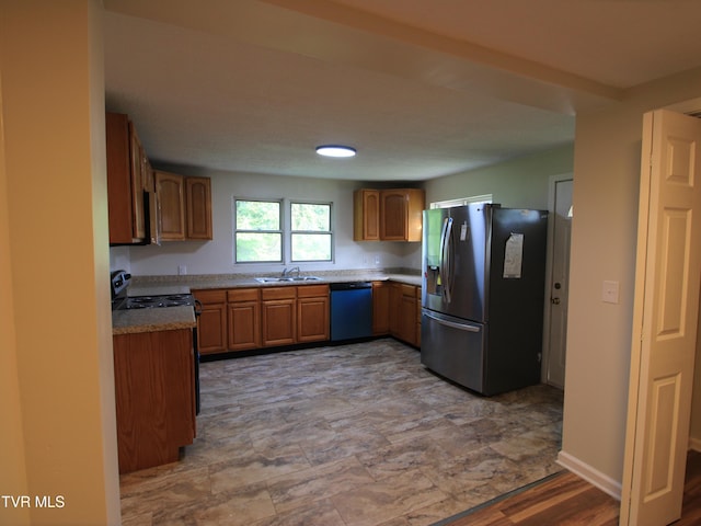 321 W Chilhowie Ave, Johnson City, TN 37604 - kitchen with stainless steel refrigerator with ice dispenser, dishwashing machine, a sink, and brown cabinetry