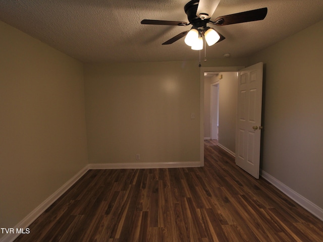 321 W Chilhowie Ave, Johnson City, TN 37604 - unfurnished room with dark wood finished floors, a ceiling fan, baseboards, and a textured ceiling
