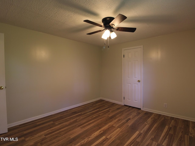 321 W Chilhowie Ave, Johnson City, TN 37604 - empty room with dark wood-type flooring, a ceiling fan, and baseboards