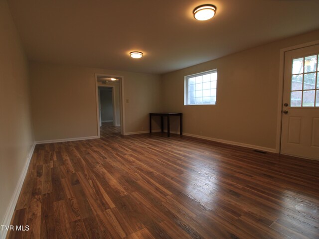 321 W Chilhowie Ave, Johnson City, TN 37604 - unfurnished room featuring dark wood-type flooring and baseboards