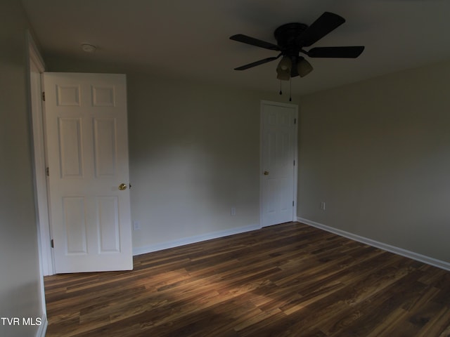 321 W Chilhowie Ave, Johnson City, TN 37604 - empty room with dark wood finished floors, ceiling fan, baseboards, and a smoke detector