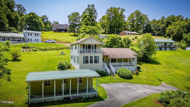 23270 Denton Valley Rd, Abingdon, VA 24211 - back of house with covered porch, a lawn, and a balcony
