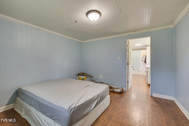 23270 Denton Valley Rd, Abingdon, VA 24211 - bedroom featuring wood-type flooring, crown molding, and wooden walls