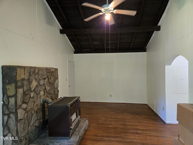 1510 Rock Creek Rd, Erwin, TN 37650 - living room featuring arched walkways, wood finished floors, a wood stove, a ceiling fan, and high vaulted ceiling