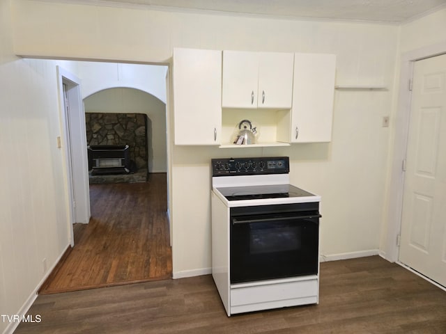 1510 Rock Creek Rd, Erwin, TN 37650 - kitchen with range with electric stovetop, dark wood-style floors, white cabinets, a fireplace, and light countertops