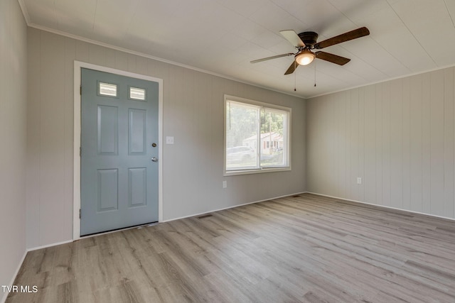 3909 Bond Dr, Kingsport, TN 37664 - foyer entrance with crown molding, wood finished floors, and a ceiling fan