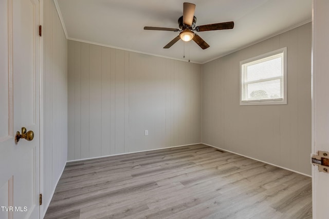 3909 Bond Dr, Kingsport, TN 37664 - empty room with ceiling fan, light wood-type flooring, and ornamental molding