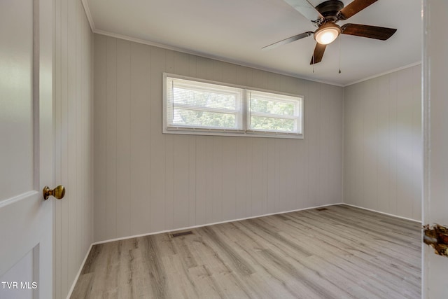 3909 Bond Dr, Kingsport, TN 37664 - empty room with wood finished floors, ceiling fan, and crown molding