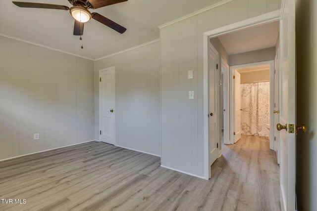 3909 Bond Dr, Kingsport, TN 37664 - unfurnished room featuring light wood-style flooring, ceiling fan, and ornamental molding