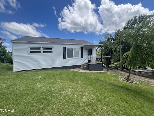 3909 Bond Dr, Kingsport, TN 37664 - back of house featuring a yard