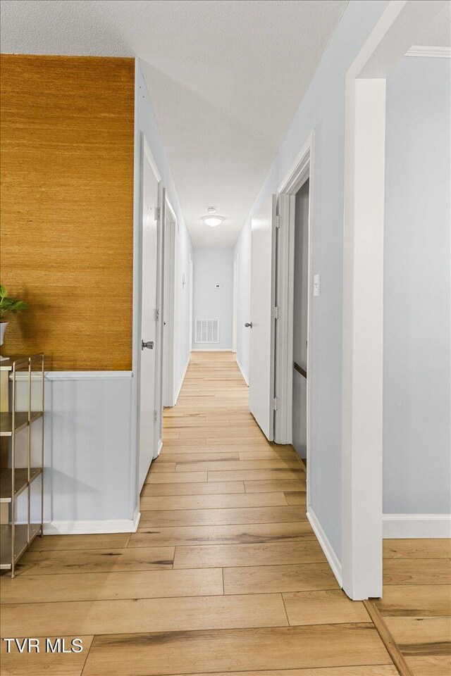 1820 Brook Hollow Rd, Johnson City, TN 37604 - hallway with baseboards and light wood-style flooring