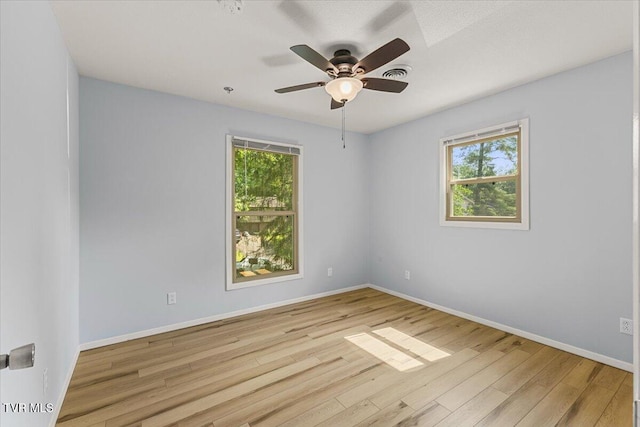 1820 Brook Hollow Rd, Johnson City, TN 37604 - spare room with wood finished floors, a ceiling fan, and baseboards