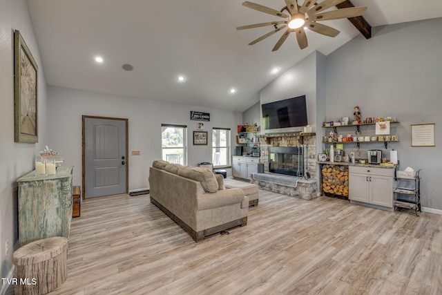 325 Barren Rd, Chuckey, TN 37641 - living room featuring a ceiling fan, a fireplace, light wood finished floors, beamed ceiling, and recessed lighting