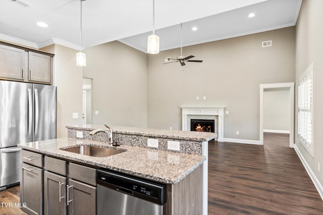 957 Riddle Rdg, Jonesborough, TN 37659 - kitchen featuring appliances with stainless steel finishes, a sink, ornamental molding, open floor plan, and ceiling fan