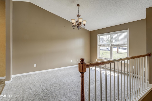 185 Thelma Hannabas Ln, Jonesborough, TN 37659 - staircase featuring carpet floors, lofted ceiling, a chandelier, baseboards, and a textured ceiling