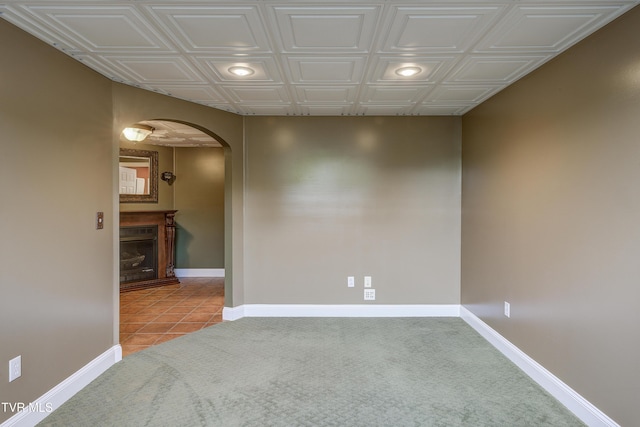 185 Thelma Hannabas Ln, Jonesborough, TN 37659 - spare room featuring arched walkways, an ornate ceiling, baseboards, recessed lighting, and light tile patterned flooring