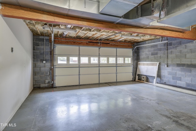 185 Thelma Hannabas Ln, Jonesborough, TN 37659 - garage featuring concrete block wall and baseboards