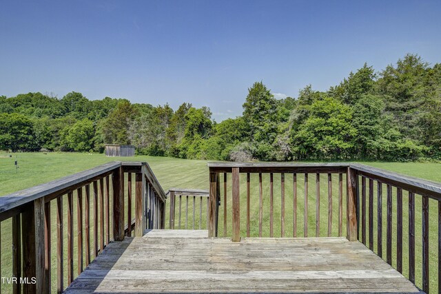 185 Thelma Hannabas Ln, Jonesborough, TN 37659 - wooden deck with a lawn and a forest view