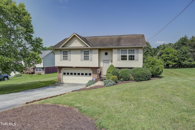 185 Thelma Hannabas Ln, Jonesborough, TN 37659 - bi-level home featuring asphalt driveway, a garage, brick siding, and a front yard