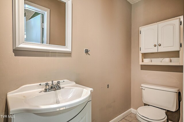 125 Cedar Valley Rd, Bristol, TN 37620 - bathroom featuring vanity, toilet, baseboards, and tile patterned flooring