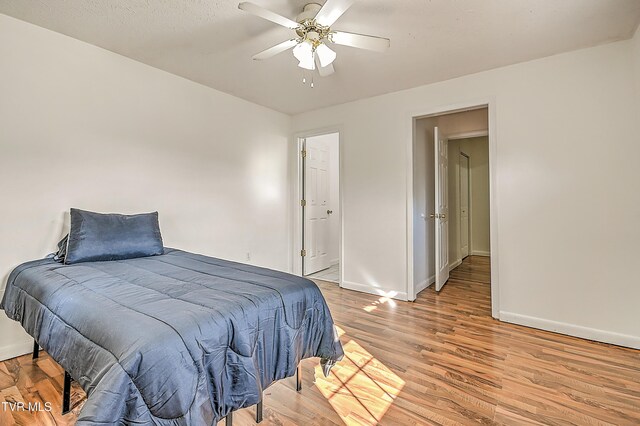 125 Cedar Valley Rd, Bristol, TN 37620 - bedroom with baseboards, light wood-style flooring, and ceiling fan