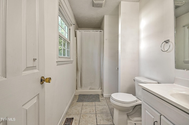 125 Cedar Valley Rd, Bristol, TN 37620 - bathroom featuring vanity, toilet, a shower stall, tile patterned floors, and baseboards