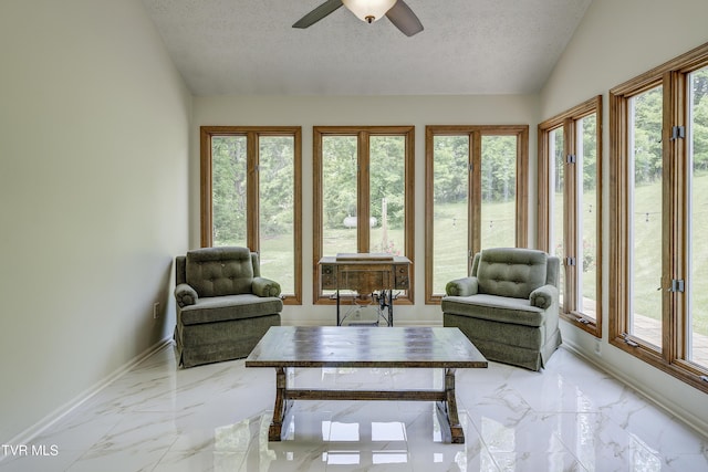 715 Powder Branch Rd, Elizabethton, TN 37643 - living room with light marble finish flooring, a textured ceiling, healthy amount of natural light, baseboards, and lofted ceiling