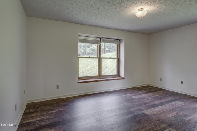 715 Powder Branch Rd, Elizabethton, TN 37643 - spare room featuring wood finished floors, a textured ceiling, and baseboards