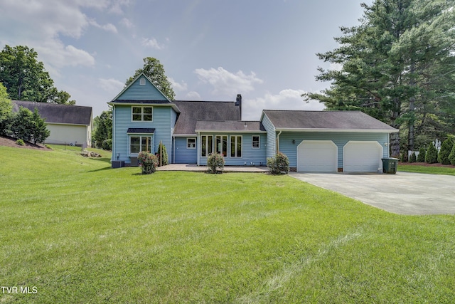 715 Powder Branch Rd, Elizabethton, TN 37643 - view of front facade with an attached garage, concrete driveway, a front yard, a chimney, and roof with shingles
