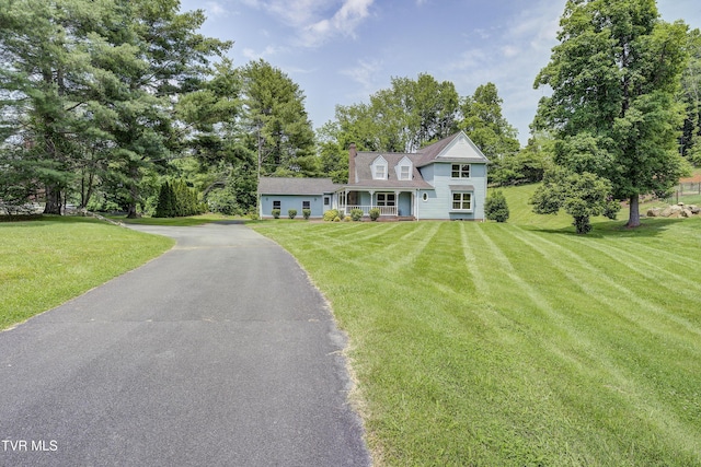 715 Powder Branch Rd, Elizabethton, TN 37643 - view of front of property featuring asphalt driveway, a front lawn, and a chimney