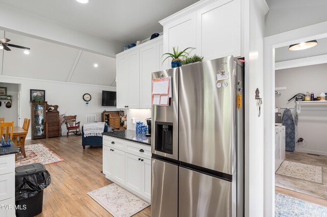 271 Laurel Way, Mountain City, TN 37683 - kitchen featuring stainless steel fridge with ice dispenser, light wood-type flooring, white cabinetry, a ceiling fan, and vaulted ceiling