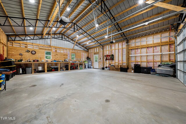 271 Laurel Way, Mountain City, TN 37683 - garage featuring a workshop area and metal wall