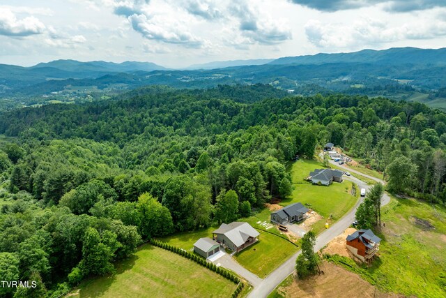 271 Laurel Way, Mountain City, TN 37683 - bird's eye view of a heavily wooded area and a mountainous background