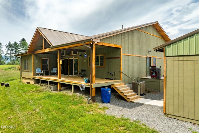 271 Laurel Way, Mountain City, TN 37683 - back of property with metal roof and a deck