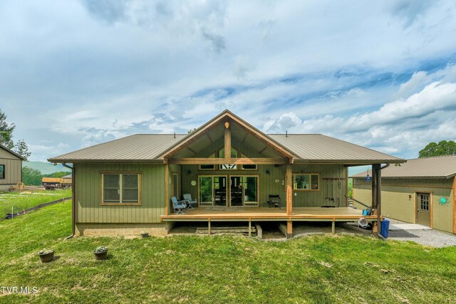 271 Laurel Way, Mountain City, TN 37683 - back of house with a wooden deck, a lawn, metal roof, and french doors