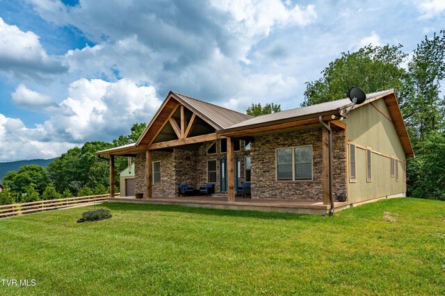 271 Laurel Way, Mountain City, TN 37683 - back of house featuring stone siding and metal roof