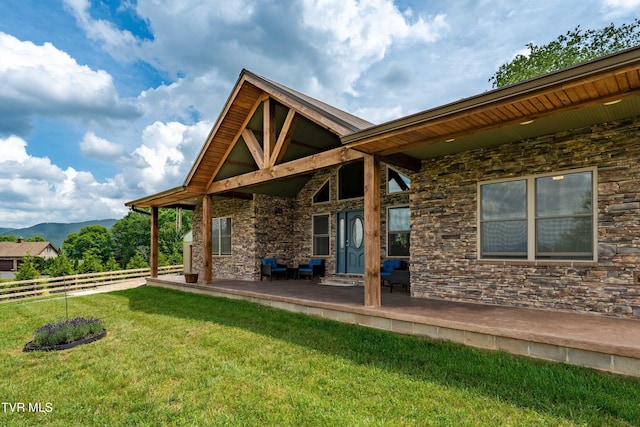 271 Laurel Way, Mountain City, TN 37683 - back of house with stone siding and a mountain view