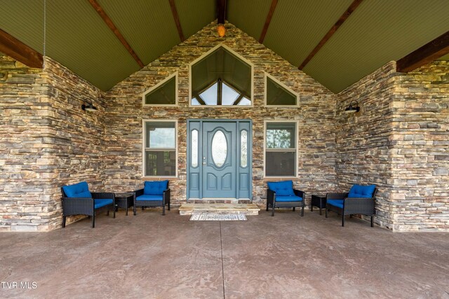 271 Laurel Way, Mountain City, TN 37683 - property entrance with a patio and stone siding