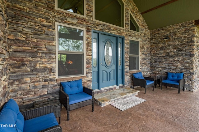 271 Laurel Way, Mountain City, TN 37683 - doorway to property with stone siding and covered porch