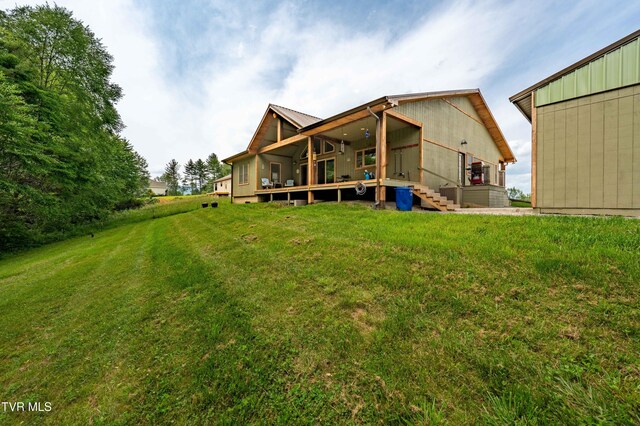271 Laurel Way, Mountain City, TN 37683 - back of property with a lawn and a deck