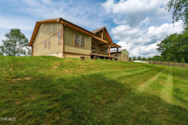 271 Laurel Way, Mountain City, TN 37683 - rear view of house with crawl space and a lawn