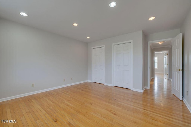 229 Ridgecrest Rd, Jonesborough, TN 37659 - unfurnished bedroom with two closets, light wood-type flooring, baseboards, and recessed lighting