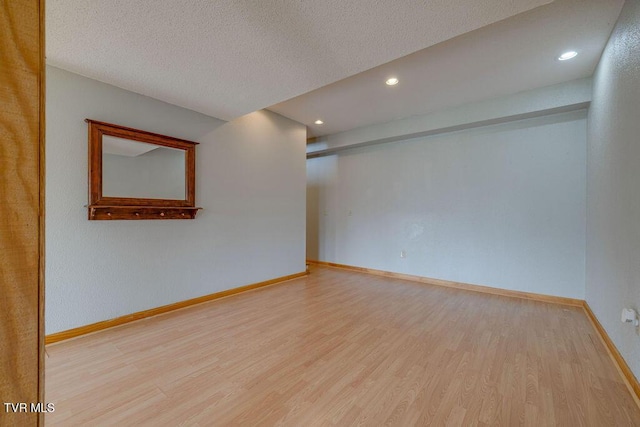 229 Ridgecrest Rd, Jonesborough, TN 37659 - spare room featuring wood finished floors, baseboards, recessed lighting, and a textured ceiling